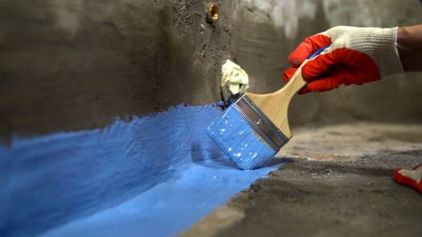 SJ Waterproofing Pros commercial waterproofing team near Brush Creek, TN